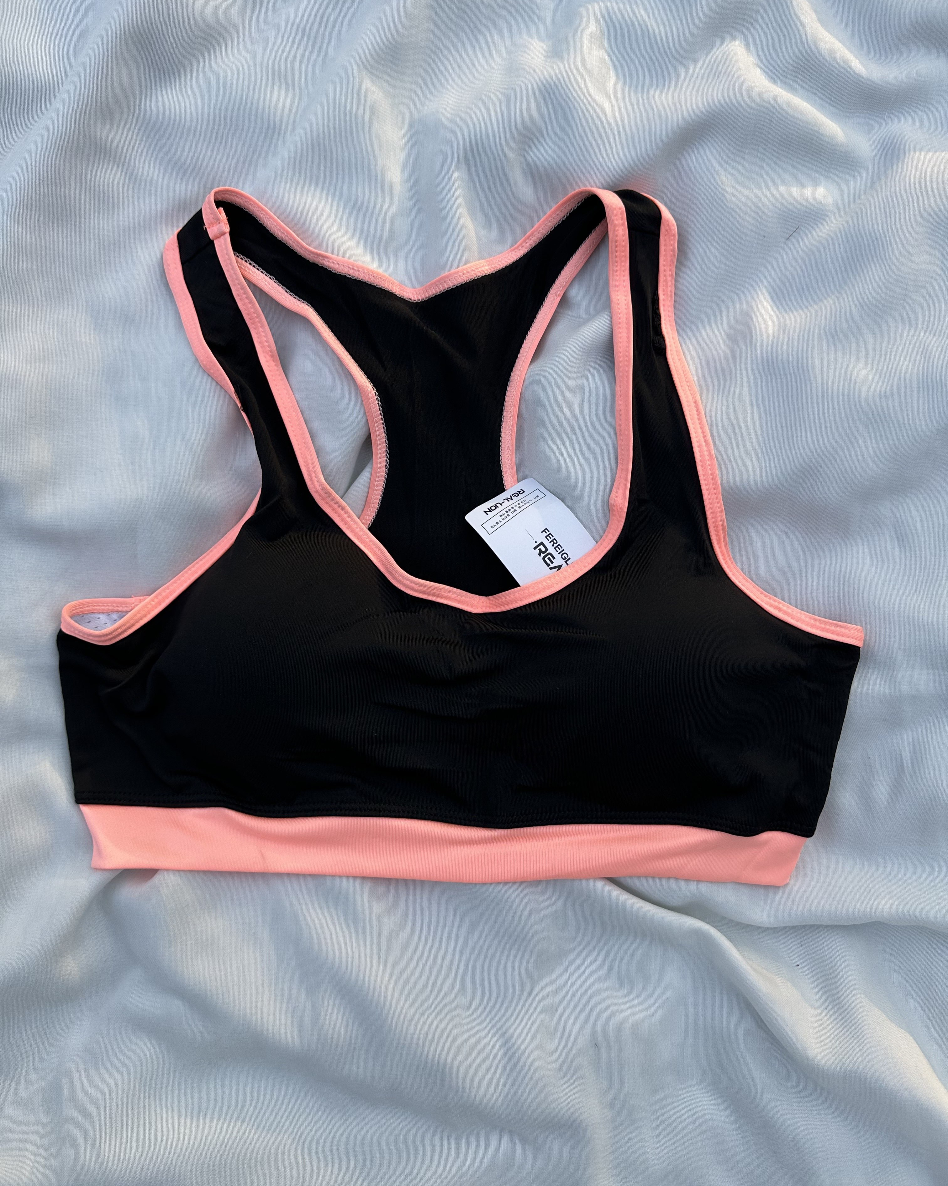 نیم تنه زنانه مدل پشت قهرمان رنگ مشکی نارنجی